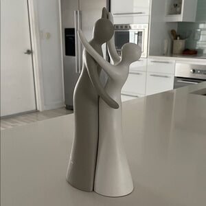 Elegant Gray and White Embracing Sculpture